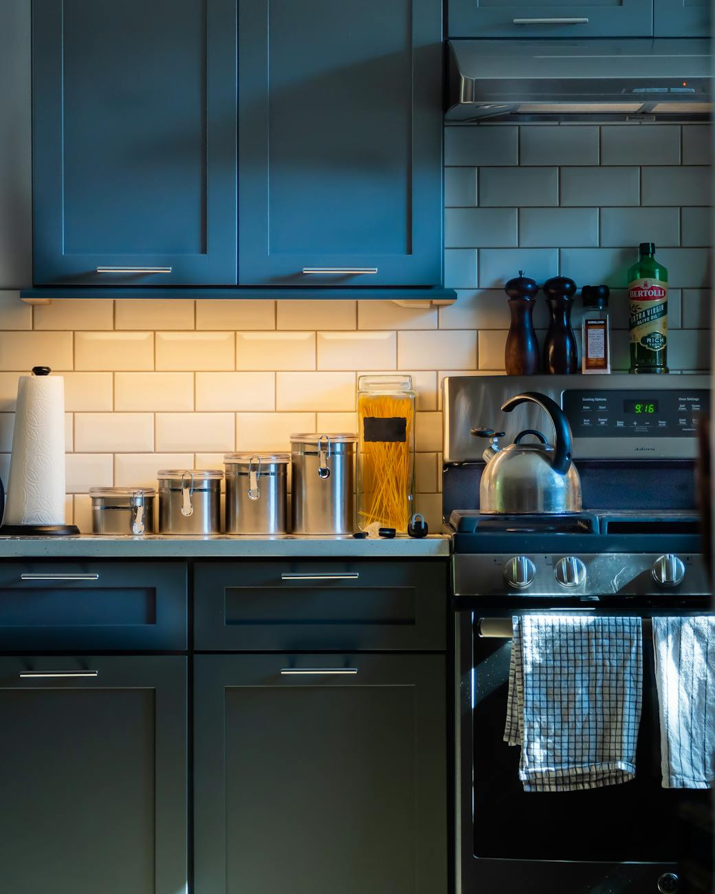 A contemporary kitchen showcasing modern cabinetry and stainless steel appliances.